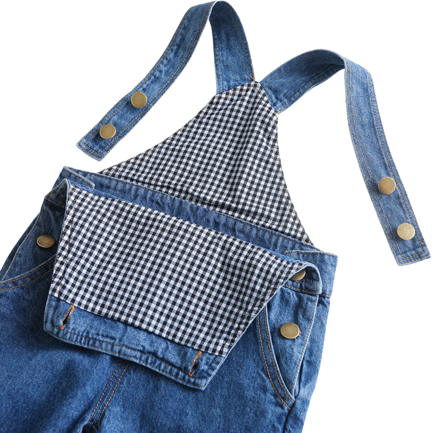 Close-up of a blue denim overall with adjustable shoulder straps and a front pocket, featuring a black-and-white gingham pattern lining and brass-tone snap buttons, on a white background.